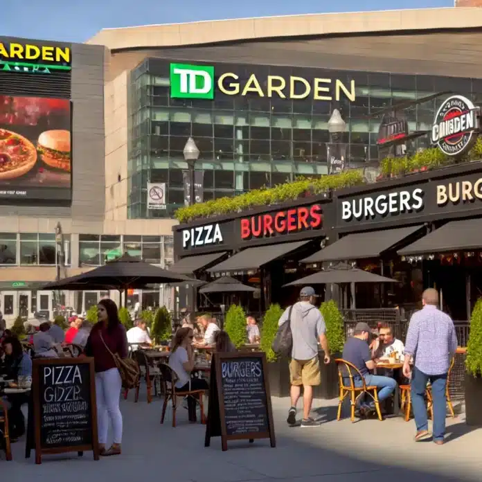 dining near TD Garden in Boston during the daytime, showcasing a variety of restaurants with outdoor seating. People are enjoying meals